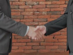 Businessman shaking hands Stock Footage
