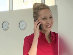 Ms pan of a businesswoman using a cell phone, Cape Town South Africa Stock Footage