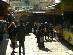 MS Shot of local Arab Residents People walking up and down steps at market / Jerusalem, Judea, Israel Stock Footage