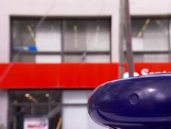 Police biz-bars flash in front of an office building. Stock Footage
