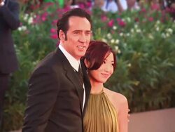 Nicolas Cage and Alice Kim Cage at the 'Joe' Red Carpet in Venice, Italy, on 8/30/13. (Getty Images Entertainment Video) Stock Footage