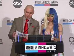 Pitbull and Nicki Minaj announce the nominees for the 2011 American Music Awards (Footage by WireImage Video/Getty Images Entertainment Video) Stock Footage