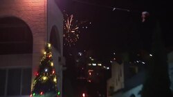 Nazareth residents launch Chinese-style lanterns into the night sky for New Year's Eve News Clip