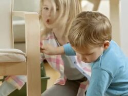 Little Siblings Playing With Repairing A Chair Stock Footage