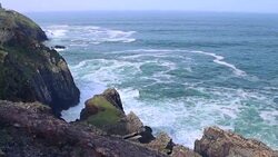View of the sea from the top of a cliff. Stock Footage