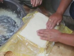 CU Nomad women making cheese / Central-south Mongolia, Mongolia Stock Footage