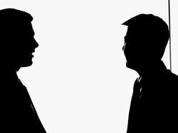 MS Silhouette of two businessmen talking and pointing to white board / China Stock Footage