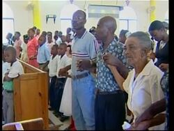 Unrest continues a year after Aristide was forced out, adds file News Clip