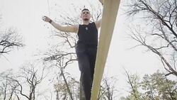 young man walking on the rope Stock Footage