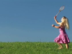 HD: Little Girl Playing Badminton Stock Footage
