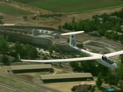 2010 AERIAL Glider flying over highway, suburbs and river / Santiago de Chile, Gran Santiago, Chile Stock Footage