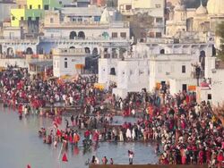 WS View of Pilgrims bathing in sacred Holy Lake at ajmer / Pushkar, Rajasthan, India  Stock Footage