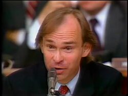 July, 1987 close up House counsel John Nields listens to North's lawyer during Iran-Contra hearings Stock Footage