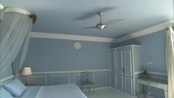 A mosquito net hangs above a hotel bed at La Maison Hotel in Rio de Janeiro. Stock Footage