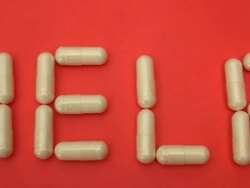 Capsules in the form of word 'HELP' Stock Footage