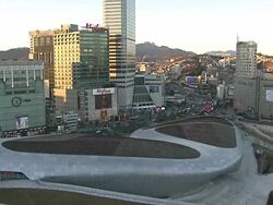 WS View of Dongdaemun Design Plaza(Special Architecture) and Dongdaemun commercial district in Seoul / Seoul, South Korea Stock Footage