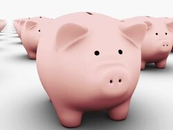 Camera pulls out to reveal and piggy bank among many, and then flies into coin slot Stock Footage