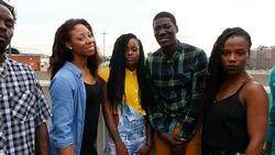 MS ZI ZO Portrait of group of friends on rooftop Stock Footage