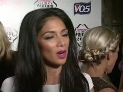 INTERVIEW: Nicole Scherzinger on family, friends affected by Hurricane Sandy, handling Gary Barlow at the Cosmo Woman of the Year Awards 2012 at Victoria & Albert Museum on October 30, 2012 in London, England (Footage by WireImage Video/Getty Images) Stock Footage