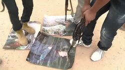 CLEAN: Snipers halt NTC assault on Kadhafi hometown News Clip