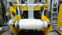 panning: fabricate blown film  by extruder machine Stock Footage