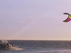 Kitesurfer's maneuver over wave Stock Footage