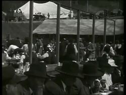 B/W PAN of Civil War veterans eating at tables at reunion / Vicksburg, Mississippi / NO SOUND Stock Footage