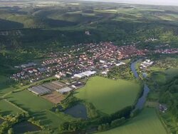 WS AERIAL View of houses and river marshland of Werra / Germany Stock Footage