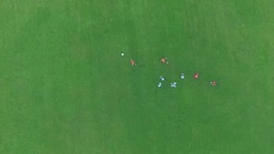 Aerial view of children playing soccer Stock Footage