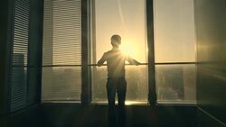 Businessman looking sunlight Stock Footage