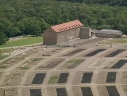 AERIAL Group of people walking through concentration camp grounds, Buchenwald, Germany Stock Footage