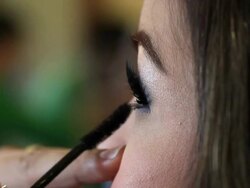 Makeup Artist Applying Make-up on Woman Eye Stock Footage