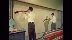 MS Draughtsmen drawing an automobile design / United States News Clip