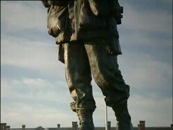 Portsmouth, Royal Marines museum; Museum entrance with statue of marine. Royal Coat of Arms. 2004; short sequence. Stock Footage