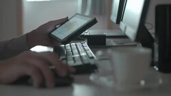 Businessman using digital tablet and Computer,Dolly shot Stock Footage