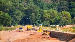 Timelapse construction road at dam Stock Footage