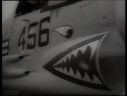 B/W 1960's close up of front of military jet / Vietnam / SOUND Stock Footage