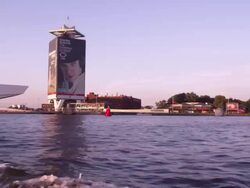 Tracking shot of the embankment near the EYE contemporary movie culture center from the river IJ Stock Footage