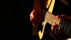 Musician playing acoustic guitar Stock Footage