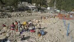 W/S CRANE UP pilgrims in Gangotri (source of the Ganges river) Stock Footage