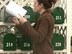 Girl checking the mail Stock Footage