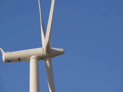 wind turbine against clear sky Stock Footage