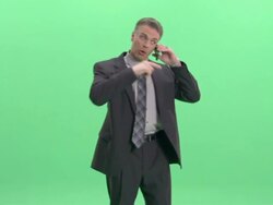 MS, Businessman talking on mobile phone in studio Stock Footage