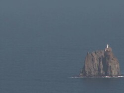 Rocky island of Stromboliccio off coast of Stromboli, Italy. March 2010 Stock Footage