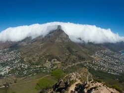 Cape Town and amazing cloud over Table Mountain, South Africa, high angle pan Stock Footage