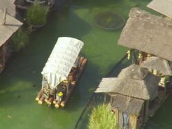 MS AERIAL Shot over paddle boat and small hut in largest theme euro park / Rust, Baden Wurttemberg, Germany Stock Footage