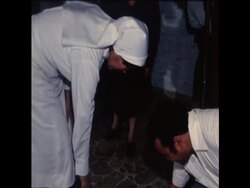 SYND 28 3 80 ASSASSINATED ARCHBISHOP ROMERO SURROUNDED BY MOURNERS News Clip