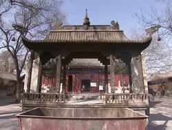 Incense emits smoke from a Taoist temple courtyard in Beijing. Stock Footage