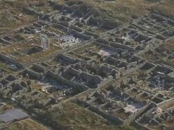 MS AERIAL TS Shot of temple ruin of delos and coastline / Delos, Cyclades, Greece Stock Footage