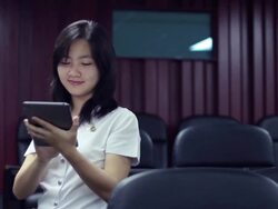 Collegian typing on digtal table Stock Footage